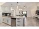 Open living space featuring the kitchen and living room, with granite counters and stainless appliances at 10136 E Southern Ave # 3091, Mesa, AZ 85209