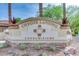Beautiful 'Coyote Landing Condominiums' sign with desert landscaping and manicured succulents at 10136 E Southern Ave # 3091, Mesa, AZ 85209