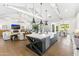 Open-concept kitchen featuring a large island, hardwood floors, and seamless flow to the living areas at 10179 E Camelot Ct, Scottsdale, AZ 85255