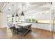 Gourmet kitchen with large island, white cabinetry, and stainless steel appliances at 10179 E Camelot Ct, Scottsdale, AZ 85255