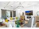 Comfortable living room with cozy fireplace and sliding barn doors at 10179 E Camelot Ct, Scottsdale, AZ 85255