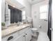 Bathroom featuring granite countertops, neutral colors, and modern fixtures at 10849 S 175Th Dr, Goodyear, AZ 85338
