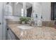 Bathroom featuring granite countertops, neutral colors, and modern fixtures at 10849 S 175Th Dr, Goodyear, AZ 85338