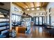 A stylish café area with pastry displays, beverage selections, seating, and bright, natural light at 10849 S 175Th Dr, Goodyear, AZ 85338