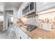 Kitchen with granite countertops, stainless steel appliances, and decorative tile backsplash at 10849 S 175Th Dr, Goodyear, AZ 85338