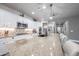 Kitchen view with granite countertops, white cabinets, stainless steel appliances, island and pantry at 10849 S 175Th Dr, Goodyear, AZ 85338