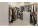 Spacious walk-in closet with custom shelving and ample storage at 10849 S 175Th Dr, Goodyear, AZ 85338