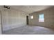 Bright unfinished bedroom with natural light from multiple windows at 11444 E Utopia Ave, Mesa, AZ 85212