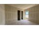 A bedroom space with a bright window showing the outside scenery at 11444 E Utopia Ave, Mesa, AZ 85212