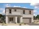 Charming two-story home features stone accents, neutral colors, a two-car garage, and professionally landscaped yard at 11444 E Utopia Ave, Mesa, AZ 85212