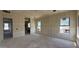 Open living room showing bright windows and great views of the community at 11444 E Utopia Ave, Mesa, AZ 85212