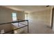 Spacious unfinished living room filled with natural light at 11444 E Utopia Ave, Mesa, AZ 85212