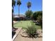 Putting green in a well landscaped backyard, perfect for outdoor leisure and relaxation at 12753 W Vista Paseo Dr, Litchfield Park, AZ 85340