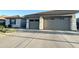 A well-maintained home with a two-car garage and a wide driveway for easy parking and access at 12753 W Vista Paseo Dr, Litchfield Park, AZ 85340