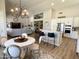 Spacious kitchen with stainless steel appliances and connecting living area with high ceilings at 12753 W Vista Paseo Dr, Litchfield Park, AZ 85340