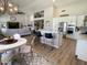 View of the kitchen showcasing its stainless steel appliances and flowing floor plan at 12753 W Vista Paseo Dr, Litchfield Park, AZ 85340