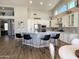 Spacious kitchen with a large island, stainless steel appliances, and stylish barstool seating at 12753 W Vista Paseo Dr, Litchfield Park, AZ 85340
