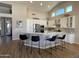 Well-lit kitchen features a large island with seating and stainless steel appliances at 12753 W Vista Paseo Dr, Litchfield Park, AZ 85340