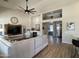 Bright living room boasts a fireplace, vaulted ceilings, and an open floorplan at 12753 W Vista Paseo Dr, Litchfield Park, AZ 85340
