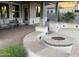 Relaxing covered patio with fire pit and outdoor seating area at 12753 W Vista Paseo Dr, Litchfield Park, AZ 85340