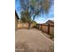 Private gravel backyard with perimeter landscaping at 1333 E Cecil Ct, Casa Grande, AZ 85122