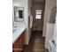 Well-lit bathroom features a vanity with ample counter space and a step-in shower with glass door at 1333 E Cecil Ct, Casa Grande, AZ 85122