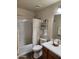 Functional bathroom with tub-shower combination and neutral decor at 1333 E Cecil Ct, Casa Grande, AZ 85122