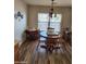 Comfortable dining space featuring a wooden table, chairs, and window at 1333 E Cecil Ct, Casa Grande, AZ 85122