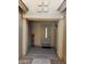 Welcoming front porch featuring a gray front door and decorative stone accents, creating a warm entrance at 1333 E Cecil Ct, Casa Grande, AZ 85122