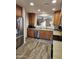 Modern kitchen with stainless steel appliances and granite countertops at 1333 E Cecil Ct, Casa Grande, AZ 85122