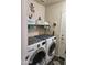 Functional laundry room with modern washer and dryer at 1333 E Cecil Ct, Casa Grande, AZ 85122