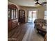 Inviting living space showcases wood-look floors, comfortable seating, and patio access at 1333 E Cecil Ct, Casa Grande, AZ 85122