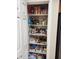 Well-stocked pantry with organized shelves and various food items at 1333 E Cecil Ct, Casa Grande, AZ 85122