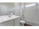 Clean bathroom features a large white vanity and a shower-tub combination at 13523 W Remuda Dr, Peoria, AZ 85383