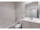 Full bathroom featuring a tub/shower combination, a white vanity, and updated fixtures at 13523 W Remuda Dr, Peoria, AZ 85383