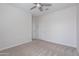Carpeted bedroom featuring neutral walls and doors at 13523 W Remuda Dr, Peoria, AZ 85383