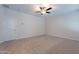 Bedroom with neutral carpet, ceiling fan, and a single window at 13523 W Remuda Dr, Peoria, AZ 85383