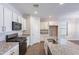 Well-designed kitchen with granite countertops, stainless steel appliances, and ample cabinetry at 13523 W Remuda Dr, Peoria, AZ 85383