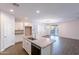 Contemporary kitchen offering an island, granite countertops, and a dining area at 13523 W Remuda Dr, Peoria, AZ 85383
