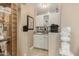 Elegant bar area featuring custom cabinets, granite countertop, and decorative accents at 13566 N 93Rd Pl, Scottsdale, AZ 85260