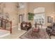 Spacious living room featuring high ceilings, neutral tones, and elegant decor at 13566 N 93Rd Pl, Scottsdale, AZ 85260