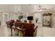 Spacious living room features a fireplace, media center, and neutral tones at 13566 N 93Rd Pl, Scottsdale, AZ 85260