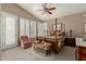 Inviting main bedroom with four poster bed and natural light at 13566 N 93Rd Pl, Scottsdale, AZ 85260