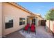 Private backyard with covered patio and lounge chairs, perfect for relaxation and outdoor enjoyment at 13584 N 102Nd Pl, Scottsdale, AZ 85260