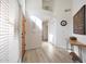 Bright foyer with wood floors, high ceilings, and contemporary decor create an inviting entrance at 13584 N 102Nd Pl, Scottsdale, AZ 85260