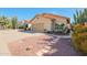 Charming single-story home features a two-car garage and low-maintenance desert landscaping at 13584 N 102Nd Pl, Scottsdale, AZ 85260