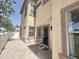 Back patio features tan stucco, string lights, and neutral colors at 1492 S Pike Ln, Gilbert, AZ 85296