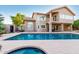 Spacious backyard boasts a sparkling pool, spa, and landscaped surroundings at 15237 S 19Th Way, Phoenix, AZ 85048