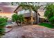 Beautiful backyard showcases lush greenery, a sparkling pool, and an inviting patio at 15237 S 19Th Way, Phoenix, AZ 85048