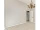Neutral bedroom featuring a chandelier, and a doorway to another part of the home at 15237 S 19Th Way, Phoenix, AZ 85048